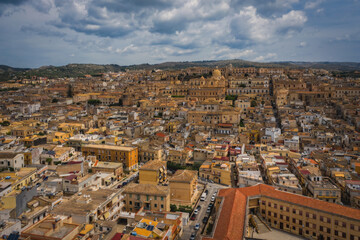 Cityscape of Noto with the cathedral of St. Nicholas of Myra San Nicolo , small town near Syracuse Siracusa , Sicily island, Italy, Europe. Aerial panoramoc picture. June 2023