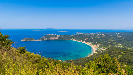 Obraz premium Panoramic view of Agios Georgios Pagon bay with Afionas village and Porto Timoni beach on cape, Corfu island, Greece