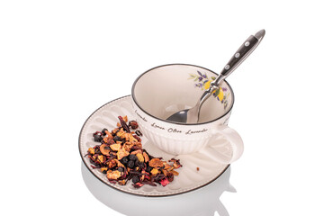 Carpathian forest fragrant tea with ceramic dishes, macro, isolated on white background.