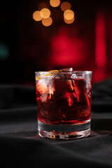 Negroni cocktail on a black table in a nightclub