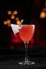 cocktail decorated with a paper airplane