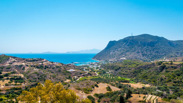 Panoramic view of Kamari port and beach with Nisyros island in the background, Kos island, Greece