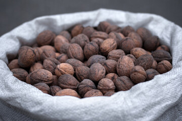 Walnuts in a bag at a farmer's market.