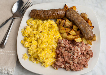 scramble eggs  with corn beef hash  and home fries,