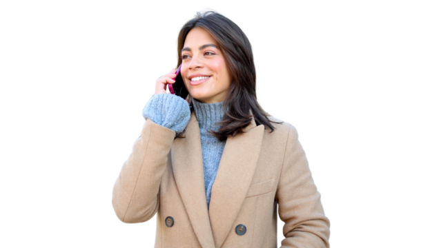 Beautiful businesswoman casually telephoning