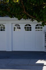 1920s vintage house with double car garage doors