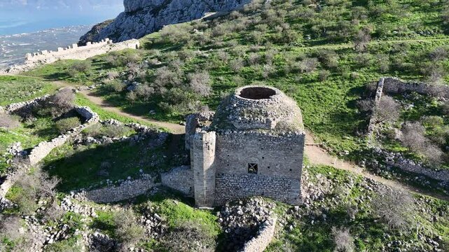 Drone footage of the historic Ahmed III Mosque in Acrocorinth, Greece. Built in 1715 by Sultan Ahmed III, this Ottoman mosque features classic architectural details and overlooks the Gulf of Corinth. 