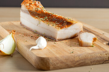Piece of cured pork belly, a traditional Romanian delicacy called 