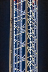 A tall building with a lot of lights on it