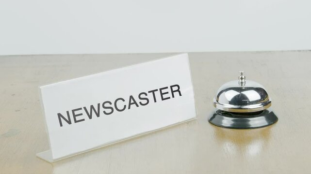Newscaster Room Office or Room with Hand Ringing The Bell on Desk or Table Multiple Times