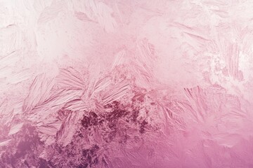 Obraz premium Delicate pink frost patterns on a windowpane.
