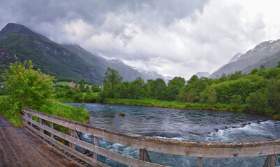 Olden Norway 2024 hiking views towards Briksdal Glacier, Jostedal Glacier largest glacier on Europe's mainland. Glacial river flowing to Sognefjord. Scandinavia, Nordic.