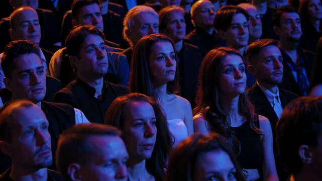 On a grand stage, a female pianist performs classical compositions and academic music. A young pianist leaves the audience in awe as the grand piano reverberates with the rich, melodic tones.