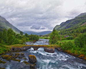 Olden Norway 2024 hiking views towards Briksdal Glacier, Jostedal Glacier largest glacier on Europe's mainland. Glacial river flowing to Sognefjord. Scandinavia, Nordic.