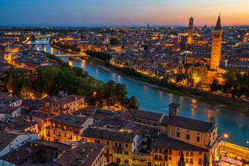 Verona aerial panoramic cityscape of old town historic district with church towers, River Adige,...