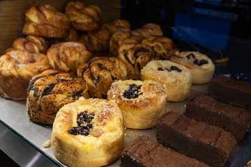 showcase with delicious pastries in a cafe
