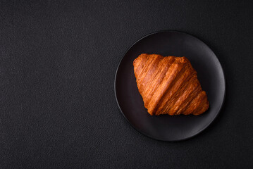 Sweet fresh crispy croissant with chocolate filling