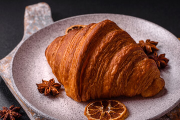 Sweet fresh crispy croissant with chocolate filling