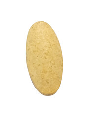 Yellow medical product on a white background. Solid large capsule on white background