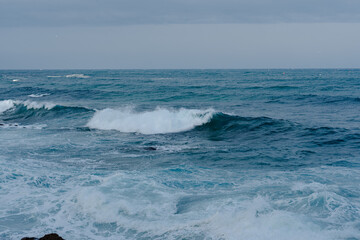 Ocean waves crashing on shore