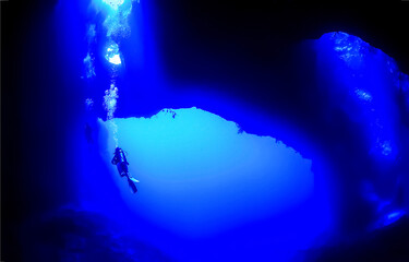 Scuba diving underwater. Underwater scuba diver in deep blue depth