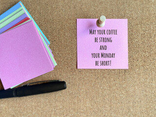 Inspirational Quote - May your coffee be strong and your monday be short text written on paper...