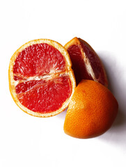 cut grapefruit on white background