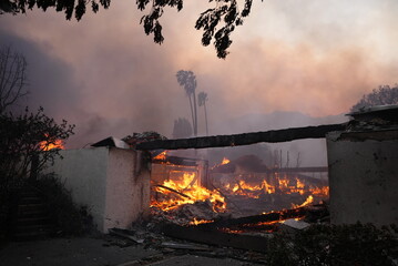 Buildings engulfed in flames in the Palisades fire