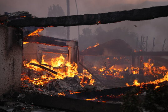 Buildings engulfed in flames in the Palisades fire