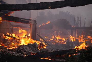 Homes burning in the Pacific Palisades wildfire