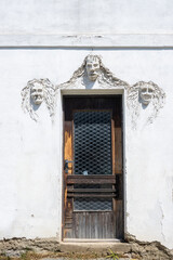 Door and three sculls, Usov, Czech republic