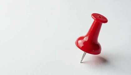 Red pushpin on white_ Office supply_ Close up_