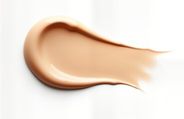 Obraz premium Liquid foundation smudge texture. Creamy makeup product spread in smudged pattern on white background. Smooth, seamless application. Trendy cosmetic product. Fluid foundation. Cosmetics. Soft