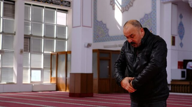 Man Praying in a Mosque
