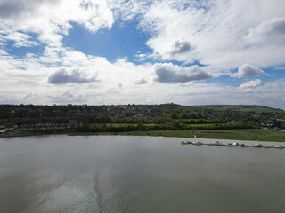High Angle View of River Thames at Rochester Town in the Unitary of Medway and Located at Kent, England United Kingdom. High Angle Drone's Camera Footage was Captured on April 20th, 2024