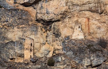Ancient defensive towers in the cliffs in the mountains of Caucasus. Cmiti, North Ossetia, Russia