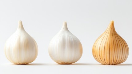 Obraz premium Isolated Garlic Bulbs in Three Poses - Three single garlic bulbs, various stages, white background, healthy food, culinary ingredient. Represents growth, flavor, and natural beauty.