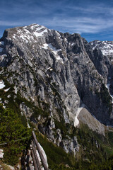 Top of a mountain with patches of snow on a sunny spring day in the Alps at the Eagle's Nest in Germany.