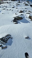 Snowy Landscape with Boulder