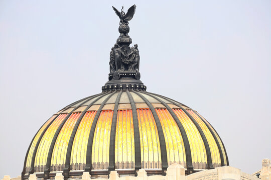 dome roof of Palacio de Bella Artes with Victoria statue on top in Mexico City