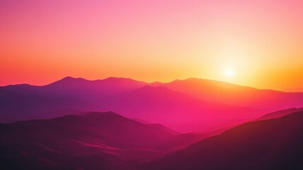 Fototapeta premium Vibrant sunset over silhouetted mountain range.