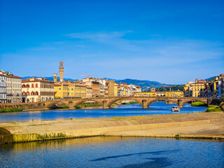 Ponte alla Carraia bridge and the historic old town houses over River Arno in Florence, Italy