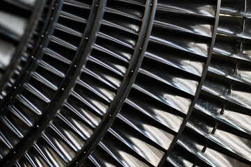 Metal blades of high-speed steam turbine in light workshop © nordroden