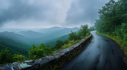 Endless Road with Yellow Center Lines Stretching Through Majestic Mountains: Low-Angle, Wide-Lens Perspective Capturing Adventure and Freedom