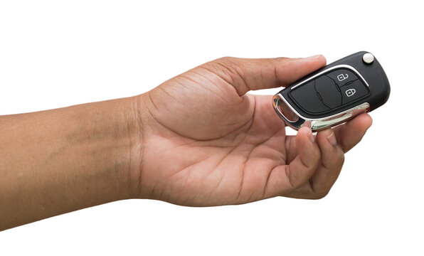 hand holding electronic car key, transparency - m&atilde;o segurando a chave eletr&ocirc;nica do carro, transpar&ecirc;ncia