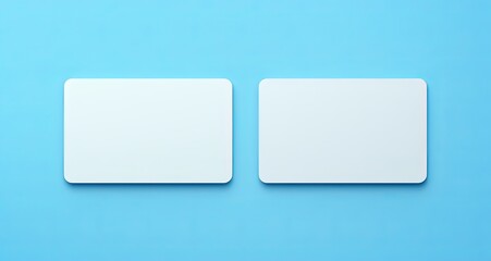 Two Blank White Plastic Card Mockups with Rounded and Rectangular Corners on Light Blue Background