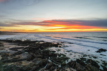 Monterey Coastline at Sunset with Vibrant Colors and Rugged Shoreline