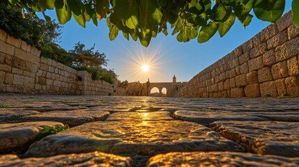 Fototapeta premium The sunrise at the Wailing Wall in Jerusalem offers a realistic and awe-inspiring view of this historically important Jewish site, the Western Wall, where ancient prayer rituals occur around the