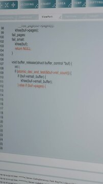 Vertical video Close up of code being typed on PC screen by admin developing software, entering commands. Computer display used by IT professional at home fixing errors in application, implementing