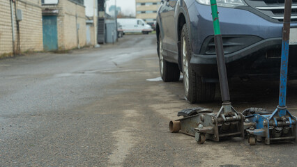 Discover vintage pneumatic jacks at a tire change service, showcasing the evolution of automotive tools. These classic devices highlight the craftsmanship and reliability of past innovations.